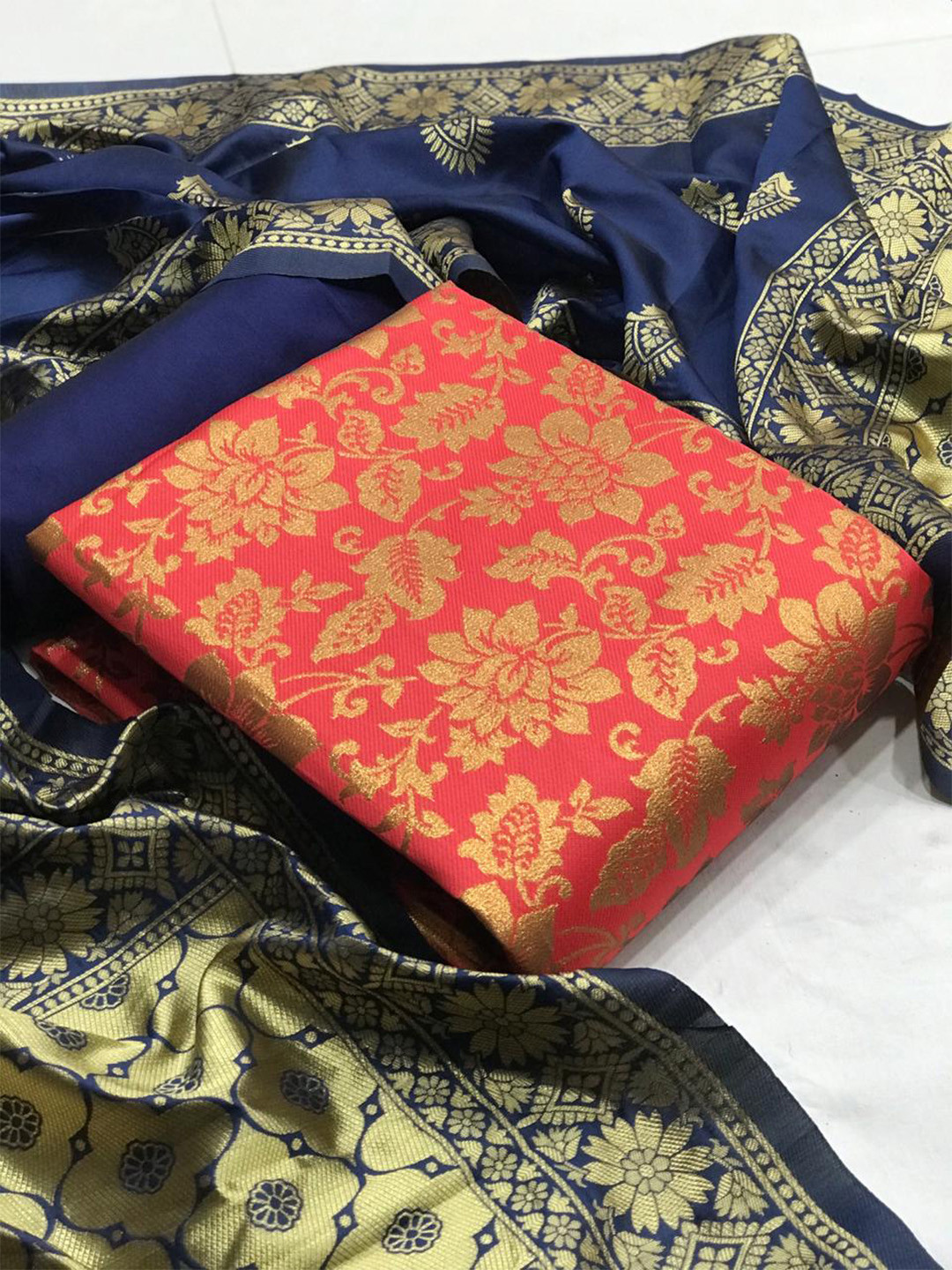 

MORLY Peach-Coloured & Navy Blue Dupion Silk Unstitched Dress Material