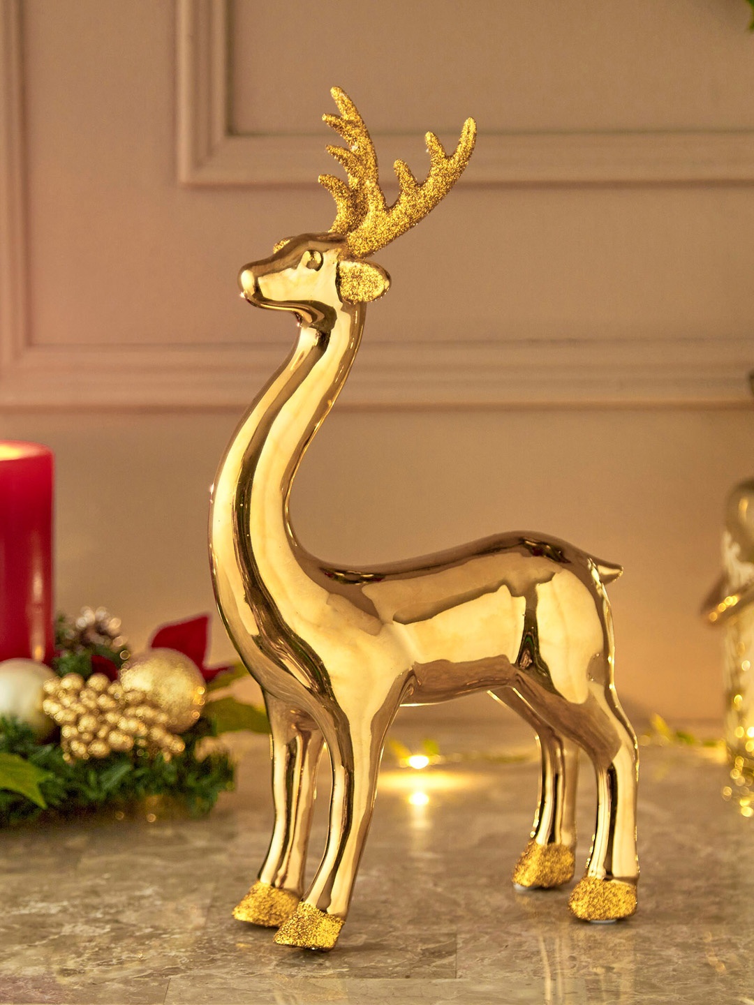 

Home Centre Carols Gold Shimmery Reindeer Figurine Showpiece