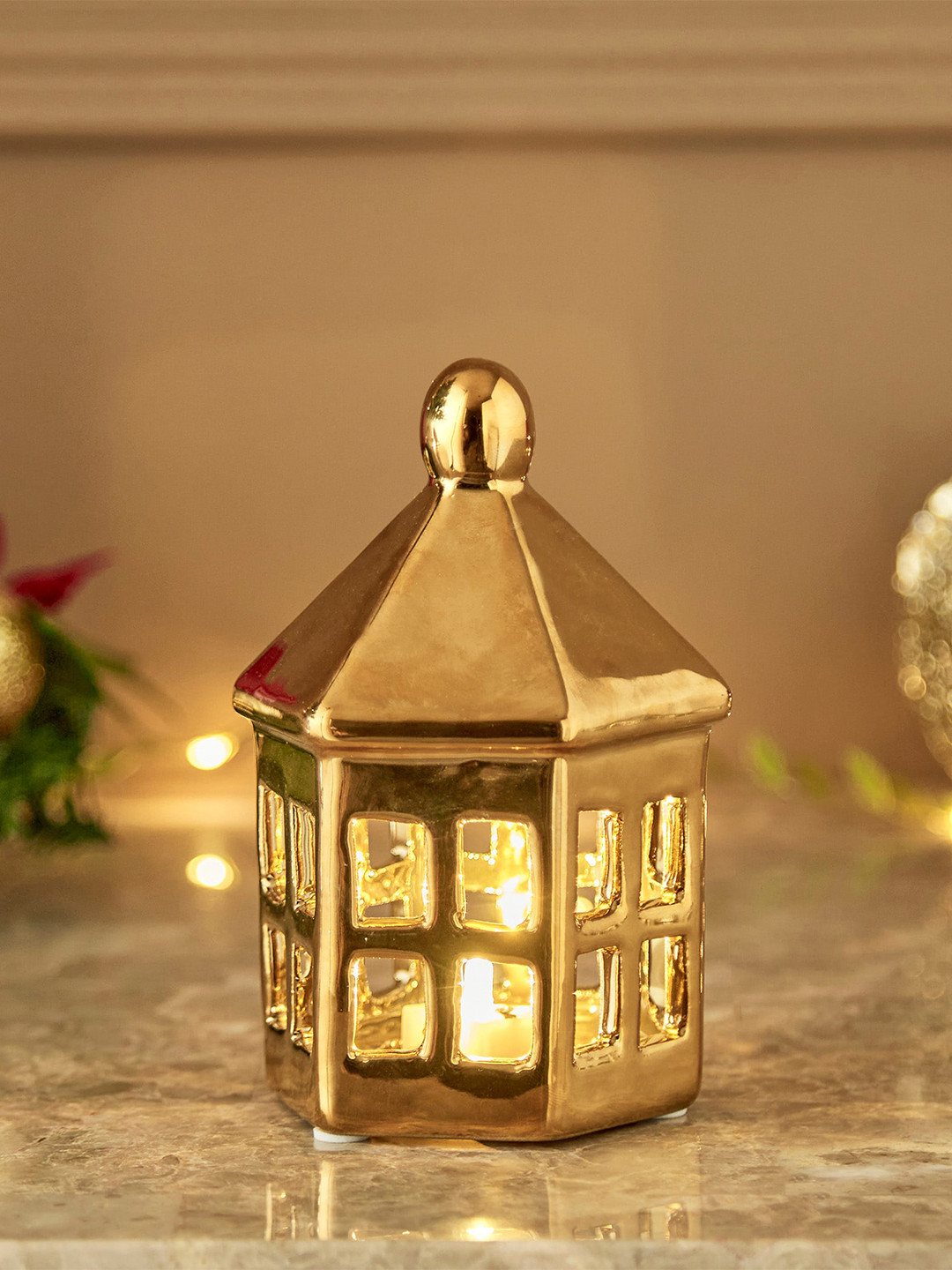

Home Centre Gold-Toned Ceramic Mini House Table Lamp