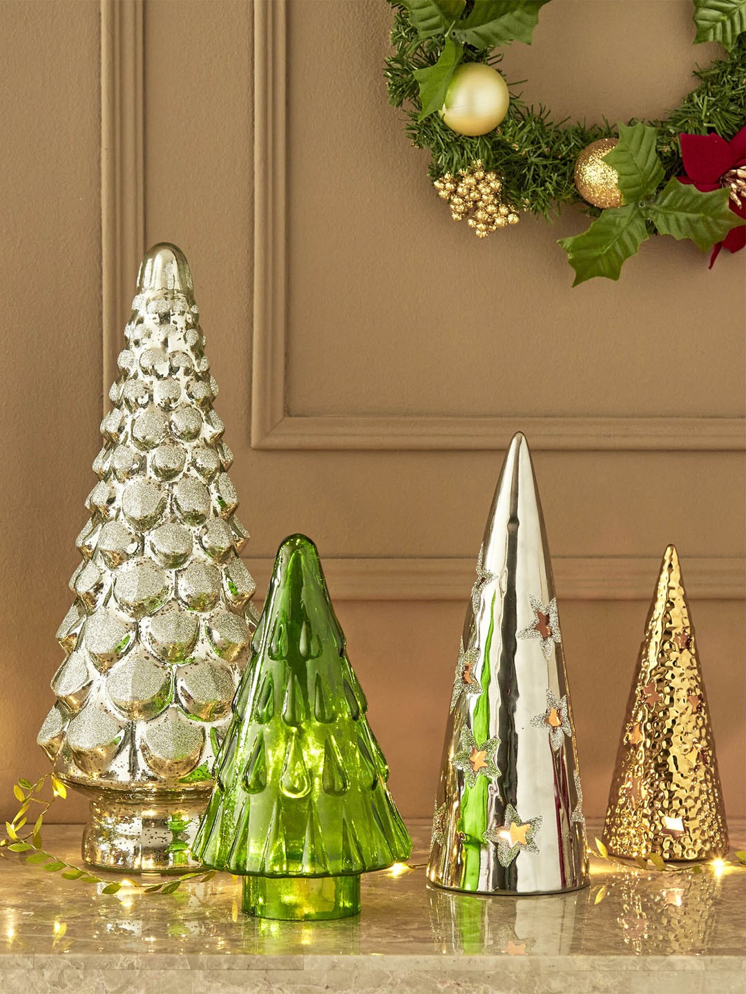 

Home Centre Silver-Toned Ceramic Christmas Tree Table Candle Holder