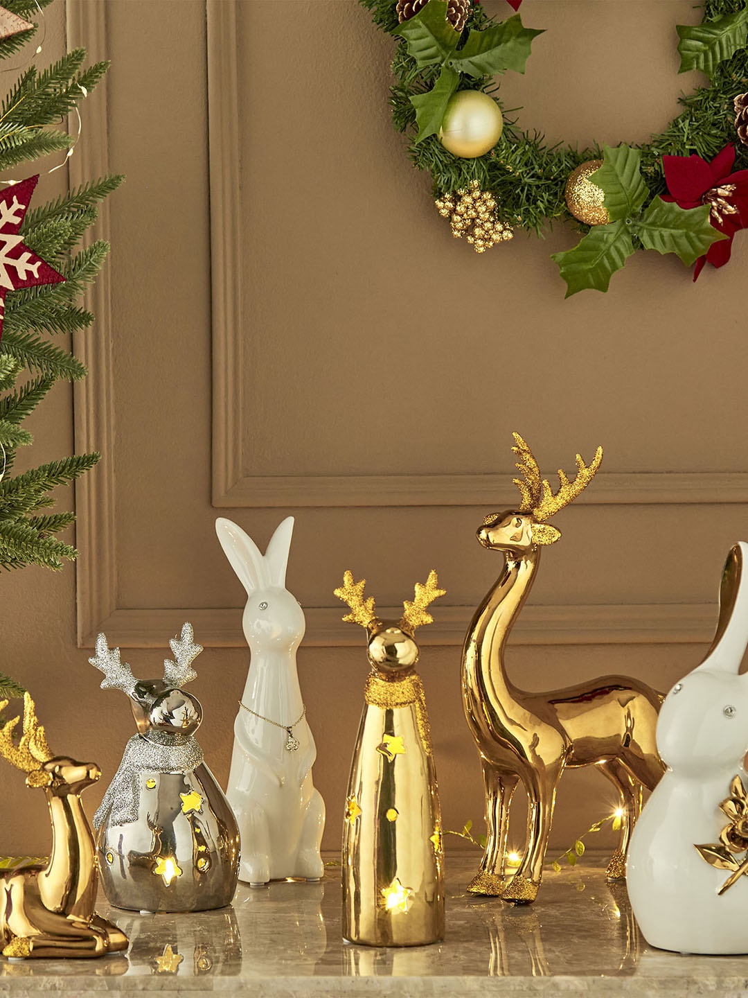 

Home Centre Carols Silver Ceramic Reindeer Snowman Table Accent Showpiece