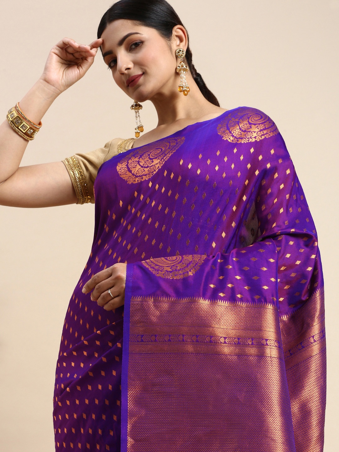 

Mitera Purple & Rose Gold Ethnic Motifs Zari Silk Blend Banarasi Saree