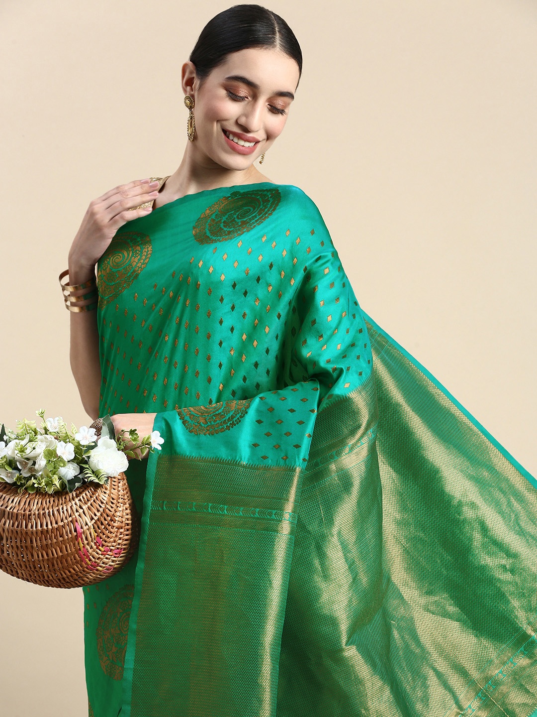 

Mitera Teal & Gold-Toned Ethnic Motifs Zari Silk Blend Banarasi Saree