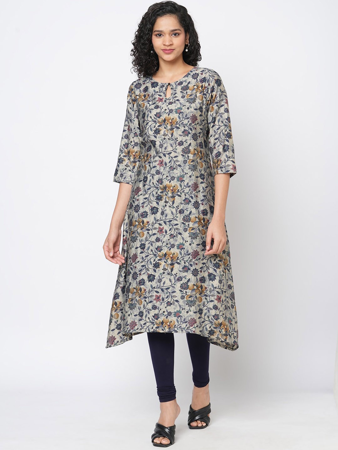 

Fusion Beats Women Floral Printed Keyhole Neck Flared Sleeves Kurta, Navy blue