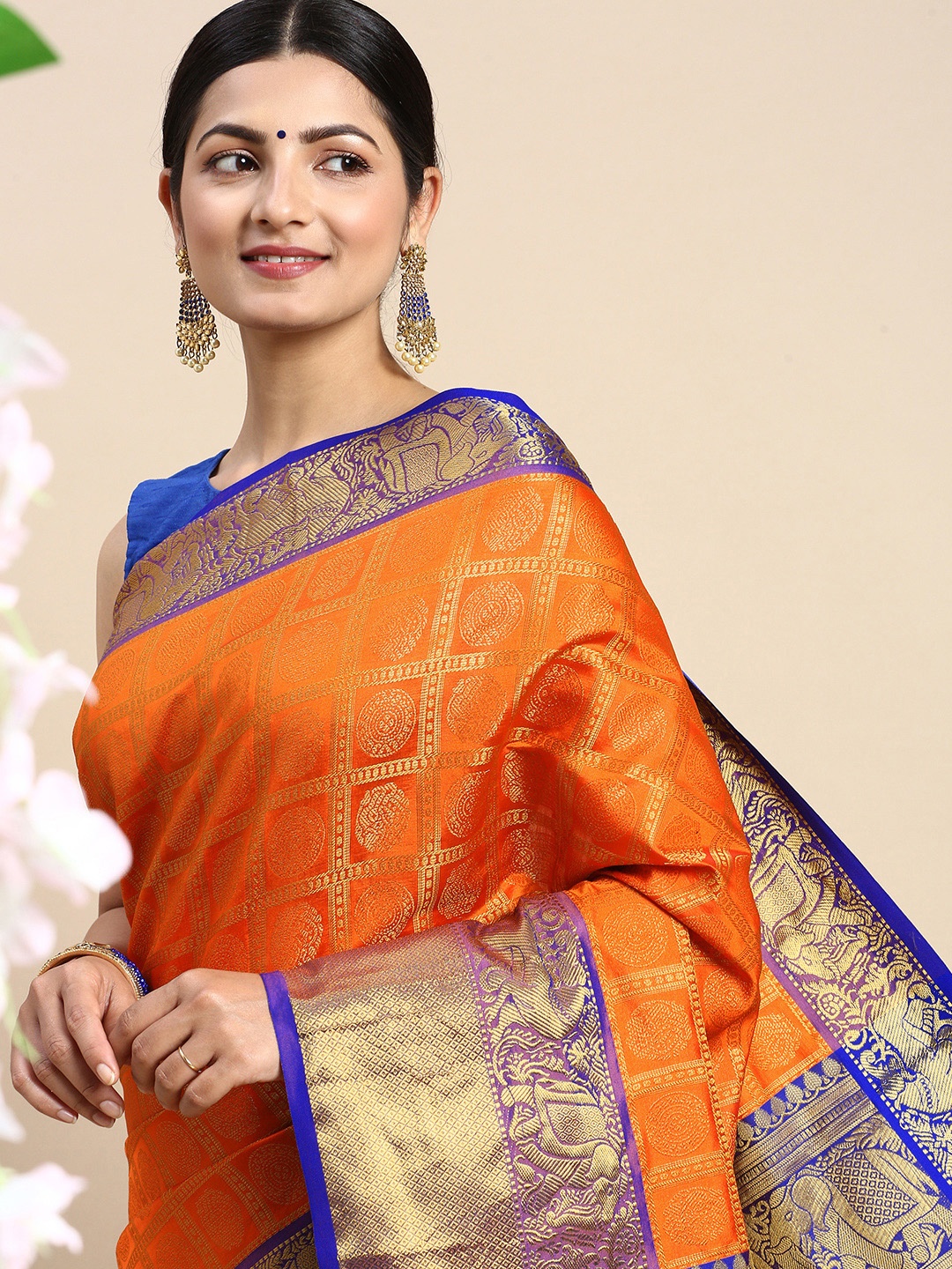 

Royal Rajgharana Saree Woven Design Floral Zari Silk Blend Kanjeevaram Saree, Orange