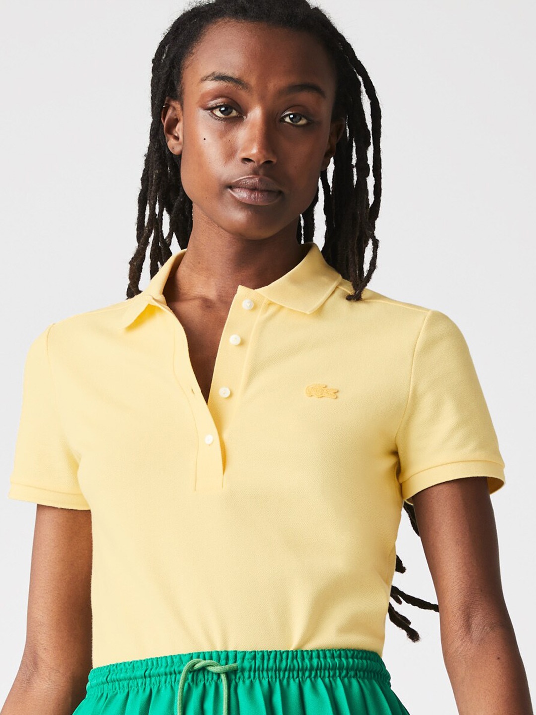 

Lacoste Women Cotton Solid Polo Collar Slim Fit T-shirt, Yellow