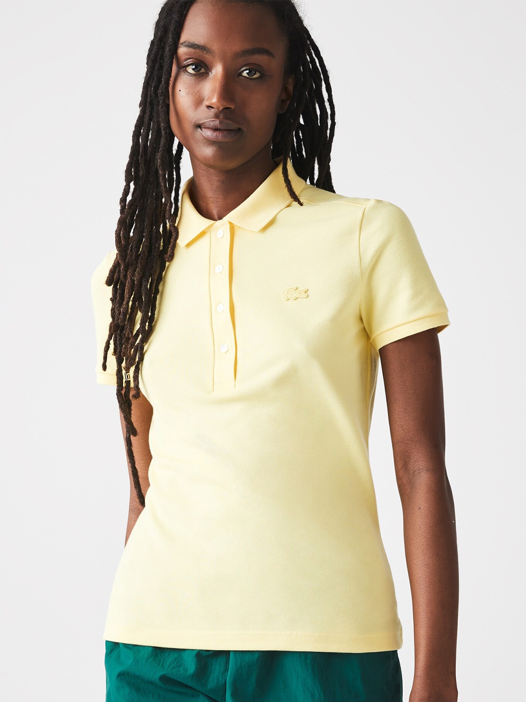 

Lacoste Women Cotton Solid Polo Collar Slim Fit T-shirt, Yellow