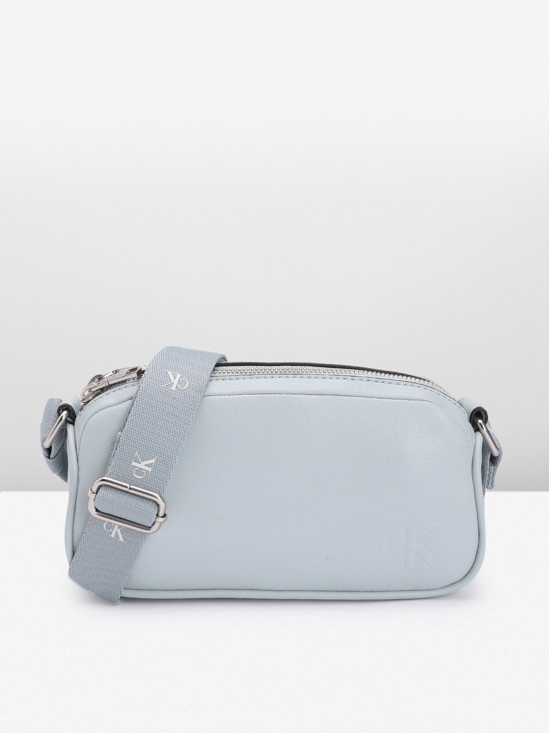 

Calvin Klein Solid Structured Ultralight Sling Bag With Minimal Brand Logo Embossed Detail, Blue