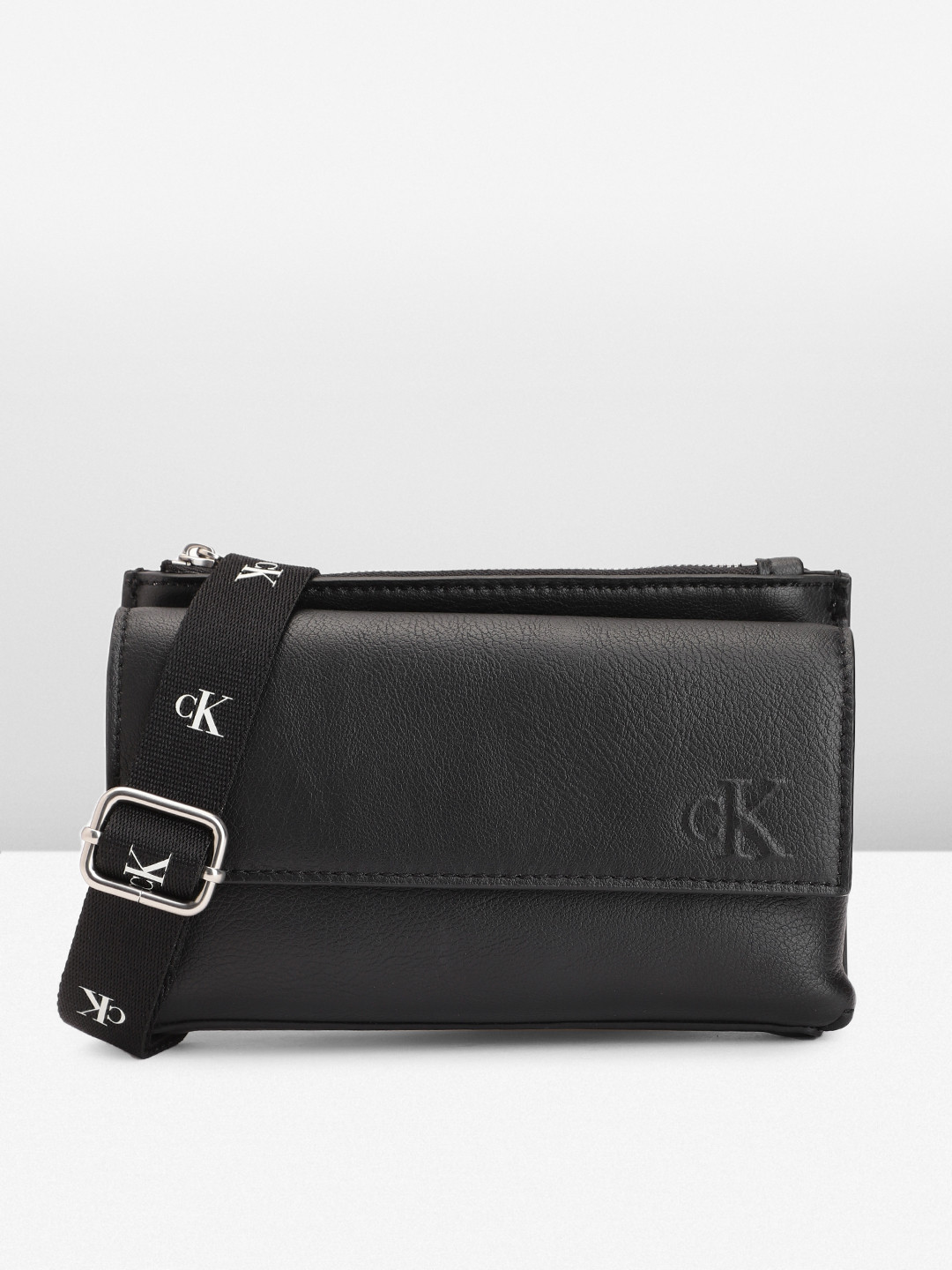 

Calvin Klein Men Solid Sling Bag, Black