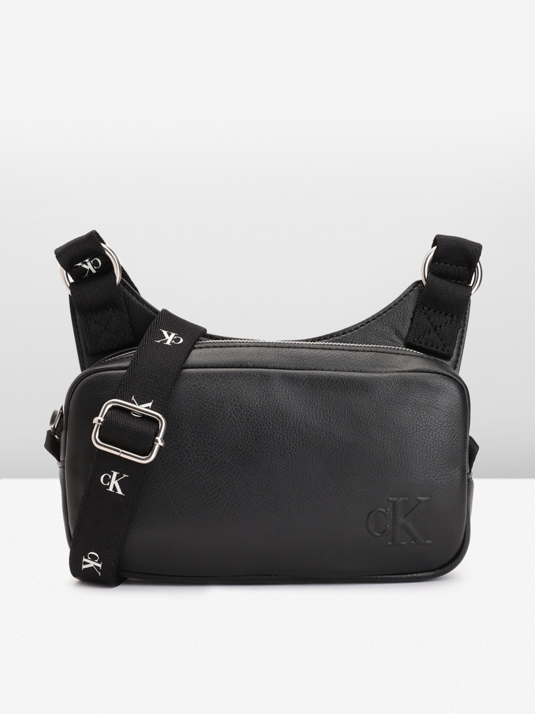 

Calvin Klein Women Solid Sling Bag, Black