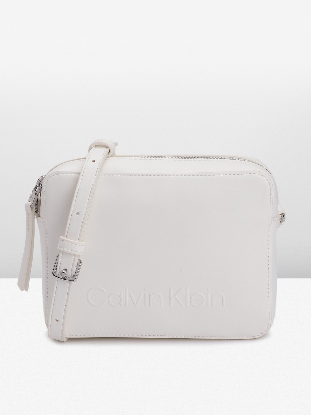 

Calvin Klein Brand Logo Printed Sling Bag, White