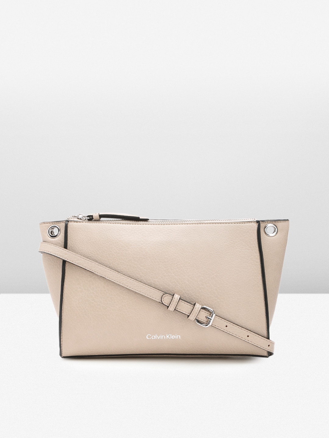 

Calvin Klein Jeans Solid Sling Bag, Cream