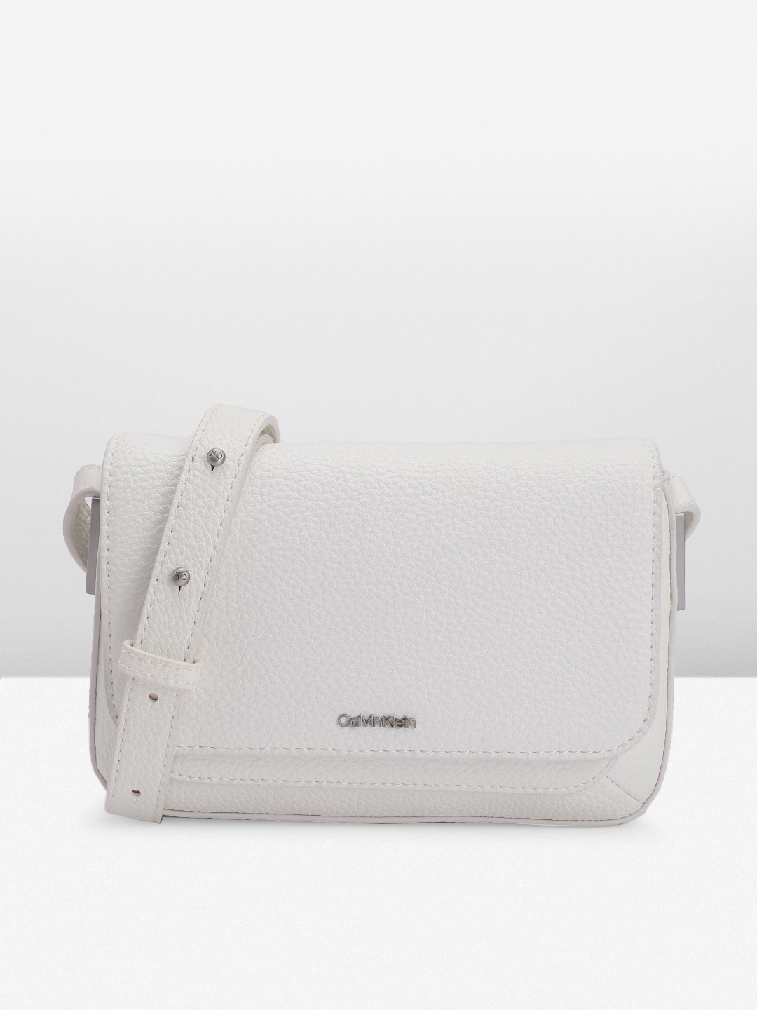

Calvin Klein Women Solid Sling Bag, White