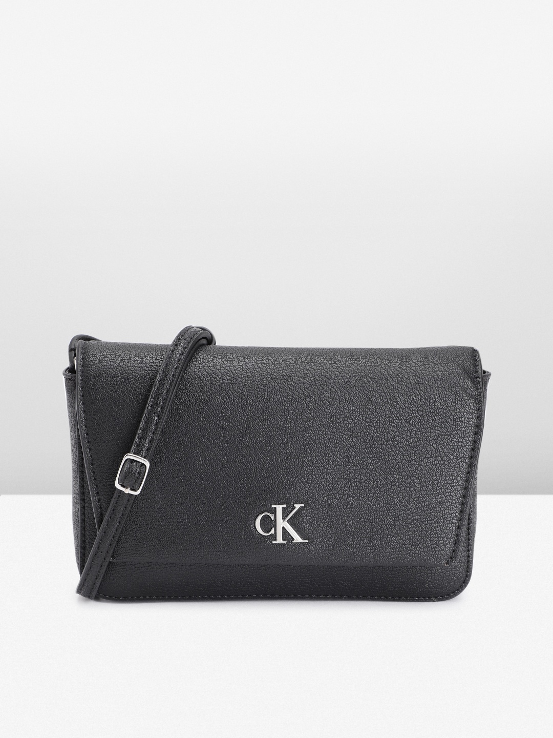 

Calvin Klein Women Solid Sling Bag, Black
