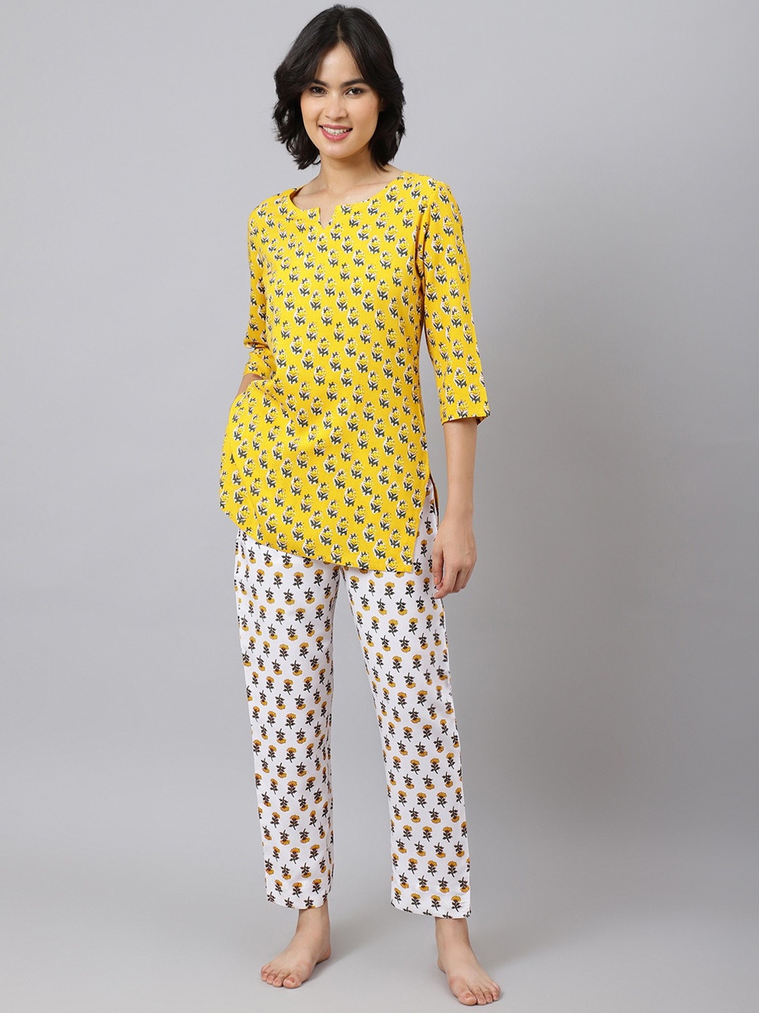 

Khushal K Women Printed Round Neck Night suit, Yellow