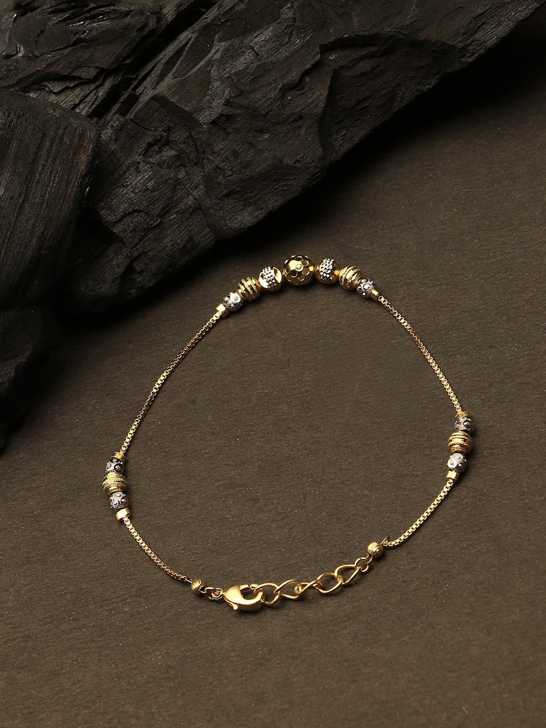 

Adwitiya Collection Women Gold-Toned & Silver-Toned Brass Handcrafted Gold-Plated Link Bracelet