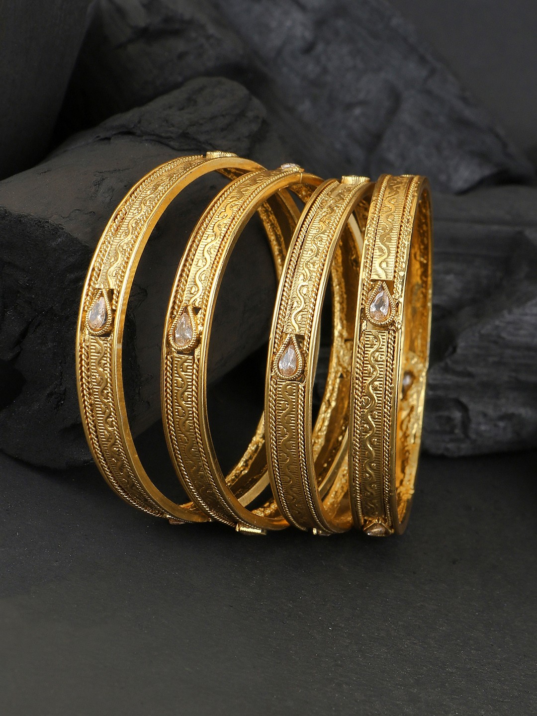 

Adwitiya Collection Set Of 4 Gold-Plated Stones Studded Bangles
