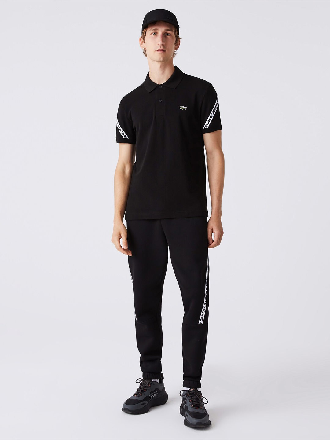 

Lacoste Men Cotton Solid Polo Collar T-shirt, Black