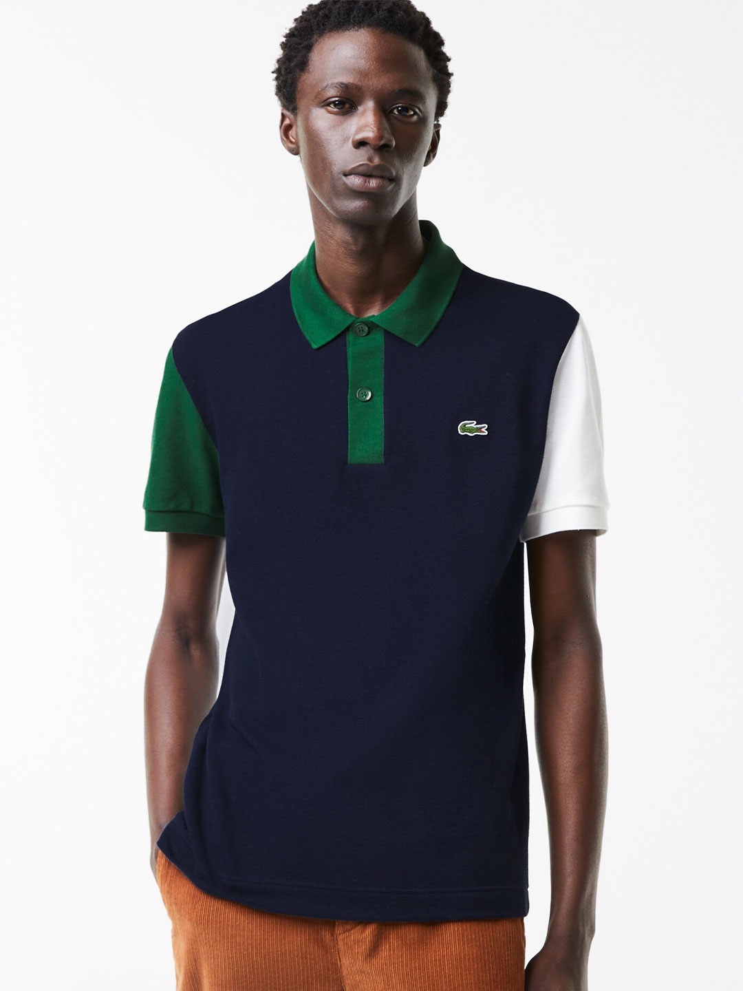 

Lacoste Men Navy Blue & White Cotton Colourblocked Polo Collar T-shirt