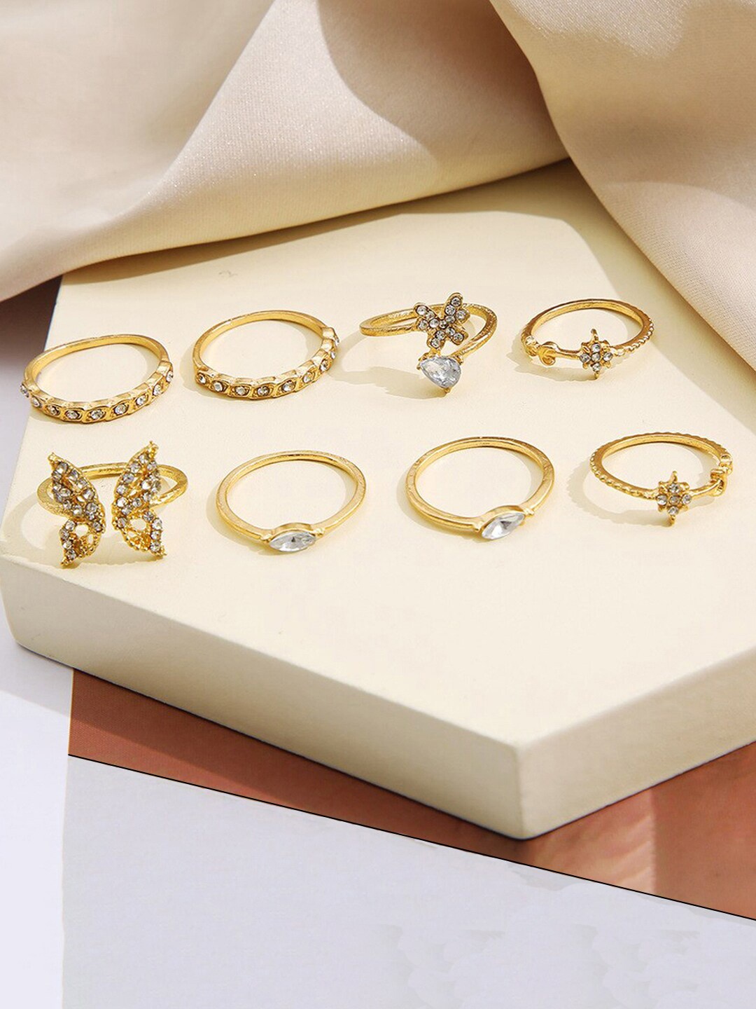 

Jewels Galaxy Set Of 8 Gold-Plated Stone Studded Contemporary Butterfly Inspired Stackable Finger Rings