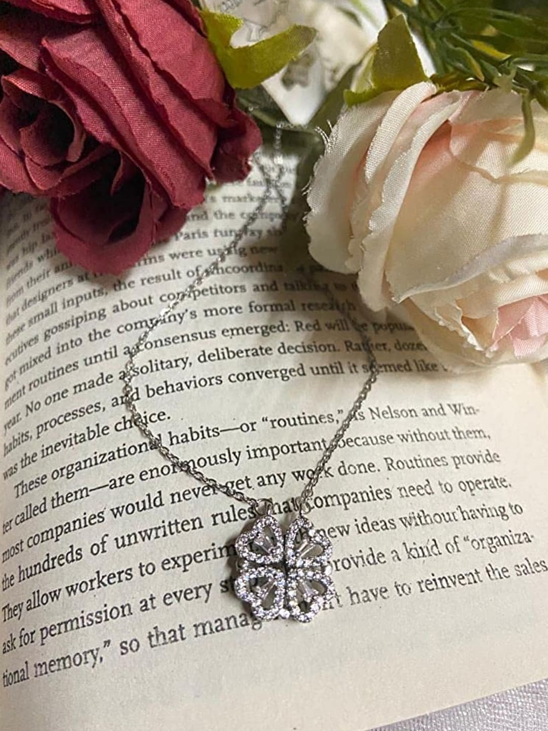 

Jewels Galaxy Silver-Plated Four Hearts Shaped Magnet Pendant With Chain