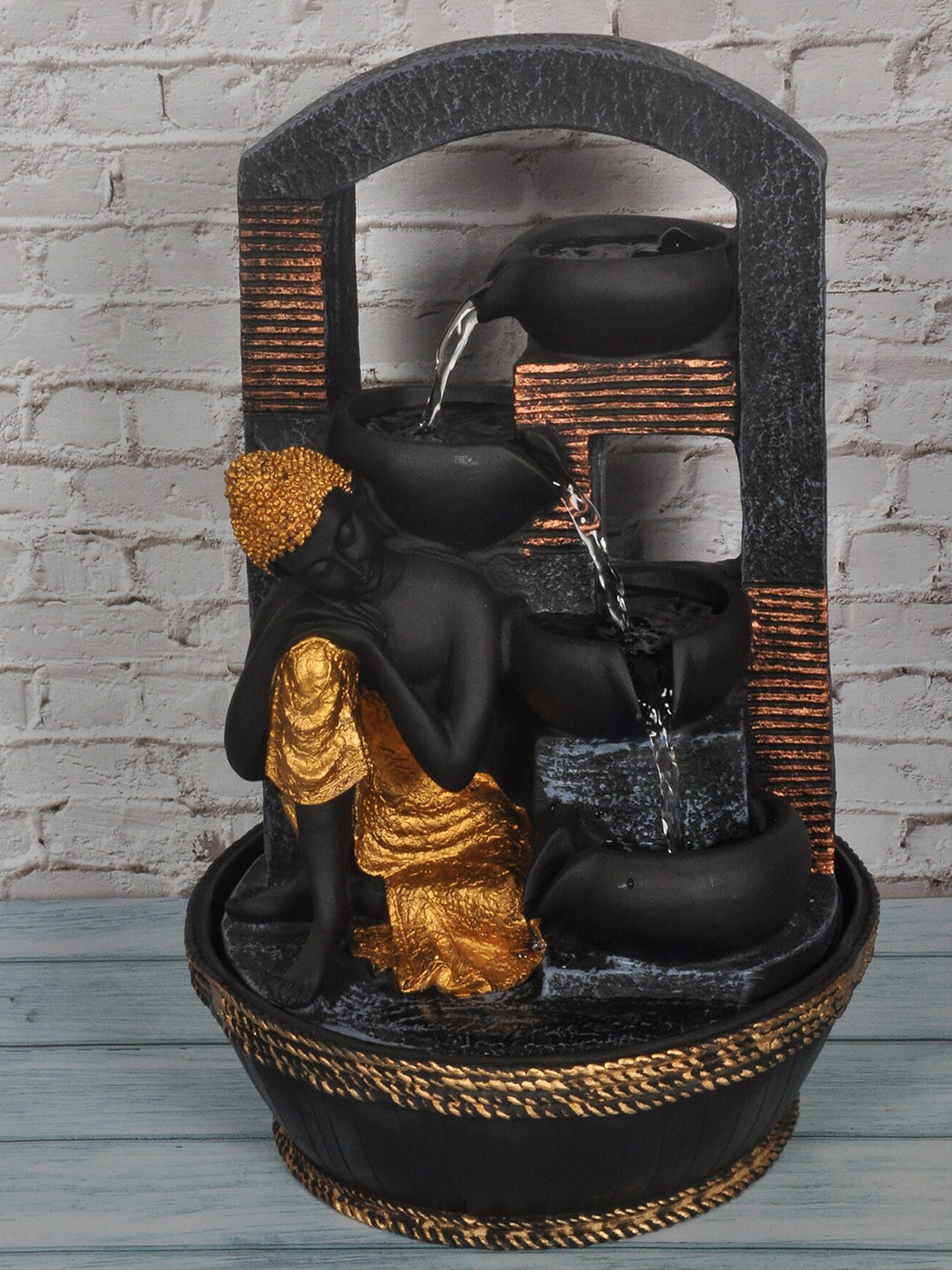 

SHREE KALA HOME DECOR Black & Gold-Coloured Buddha Resting With Side Water Fall Fountains