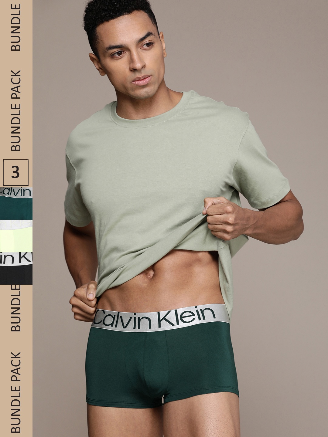

Calvin Klein Underwear Men Pack of 3 Solid Low Rise Trunks NB3074C7U, Multi
