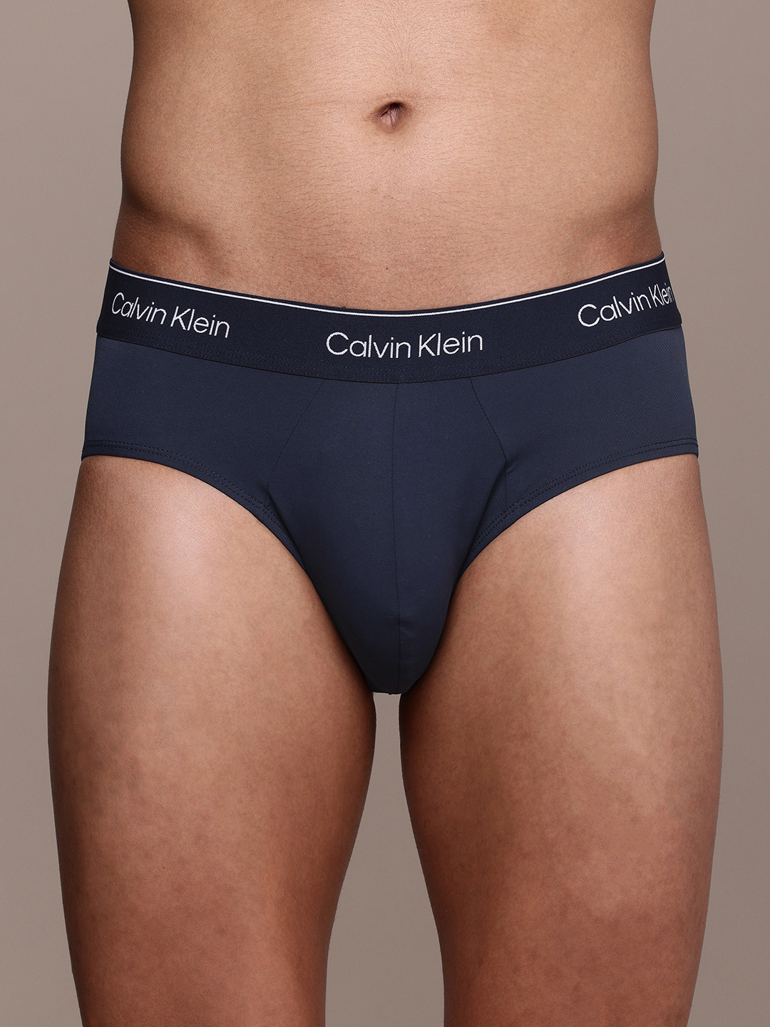

Calvin Klein Underwear Men Quick Dry Anti-UV Chlorine Resistant Briefs NB3538CEF, Navy blue