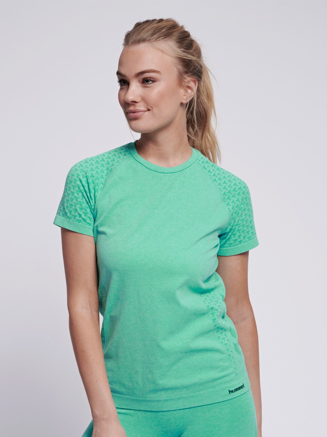 

Hummel Women Solid Round Neck T-shirt, Green