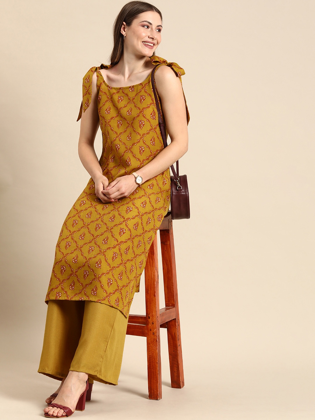 

Anouk Women Ethnic Motifs Printed Kurta with Palazzos Set, Mustard