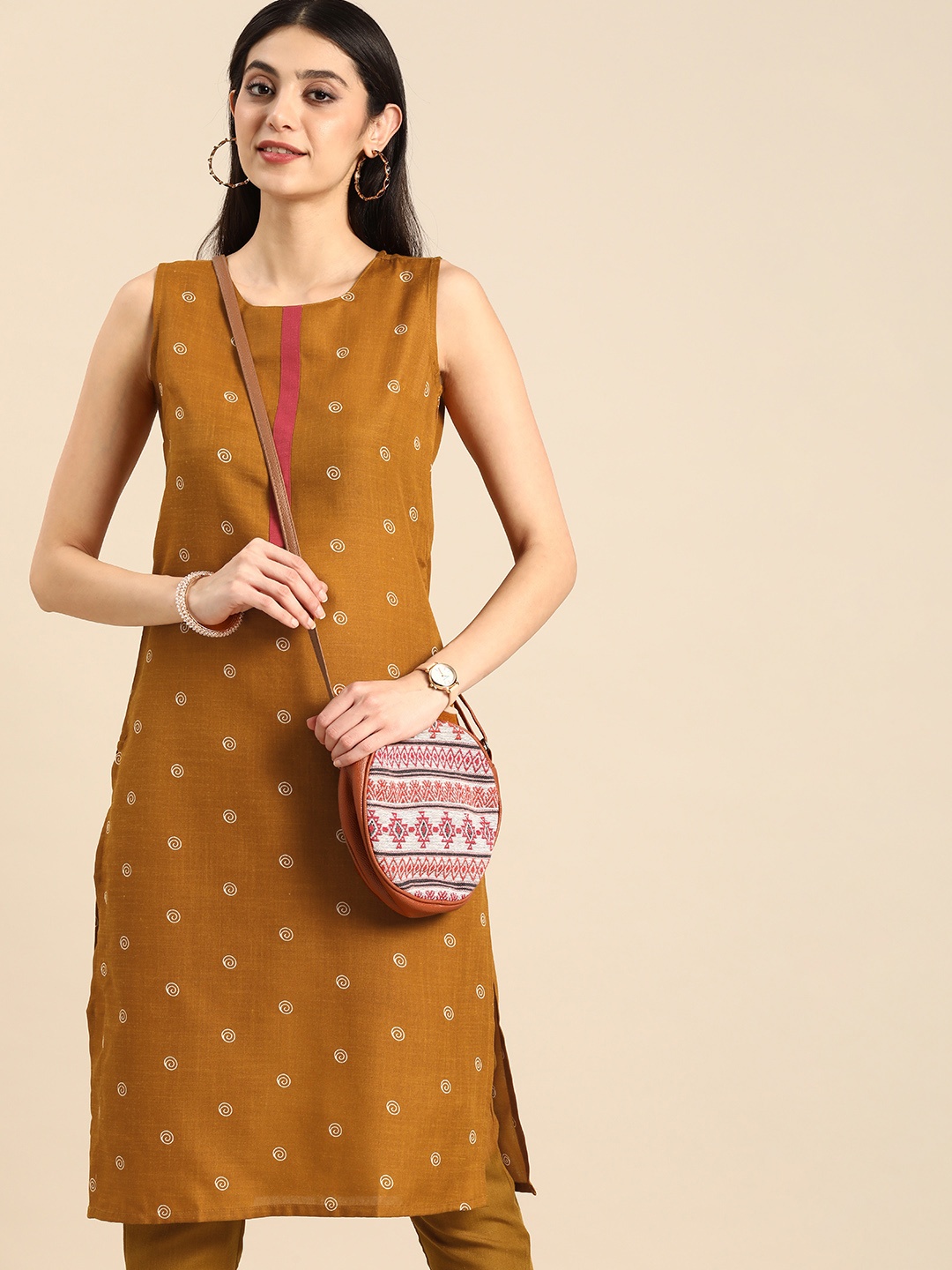 

Anouk Women Geometric Print Round Neck Straight Kurta with Trousers, Mustard