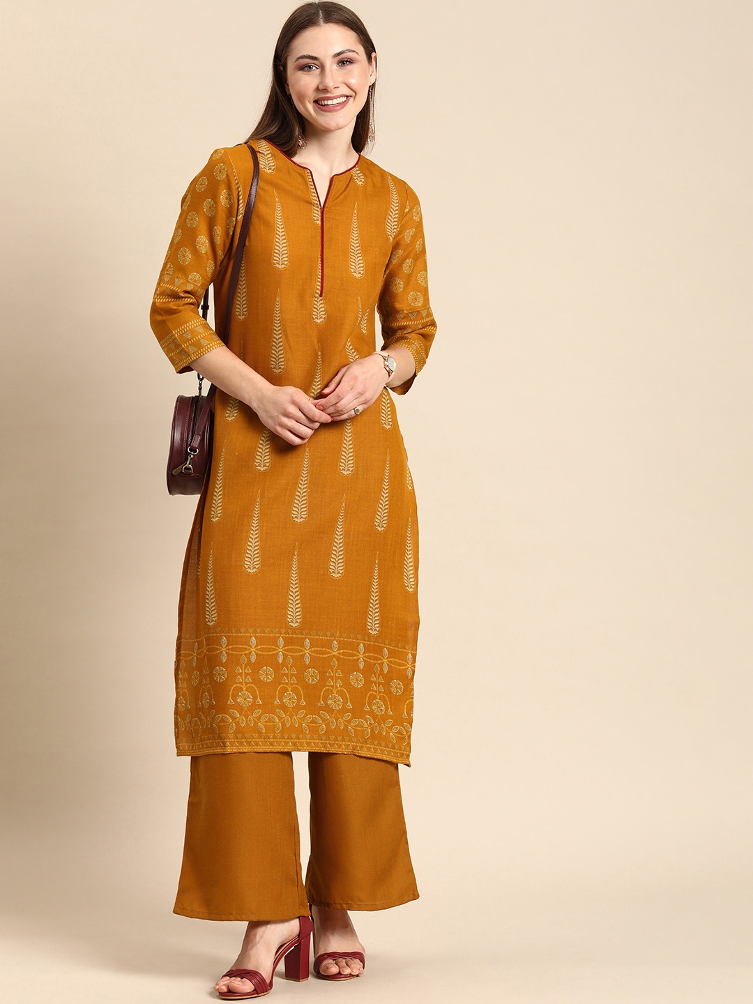 

Anouk Women Ethnic Motifs Printed Kurta with Palazzos Set, Mustard