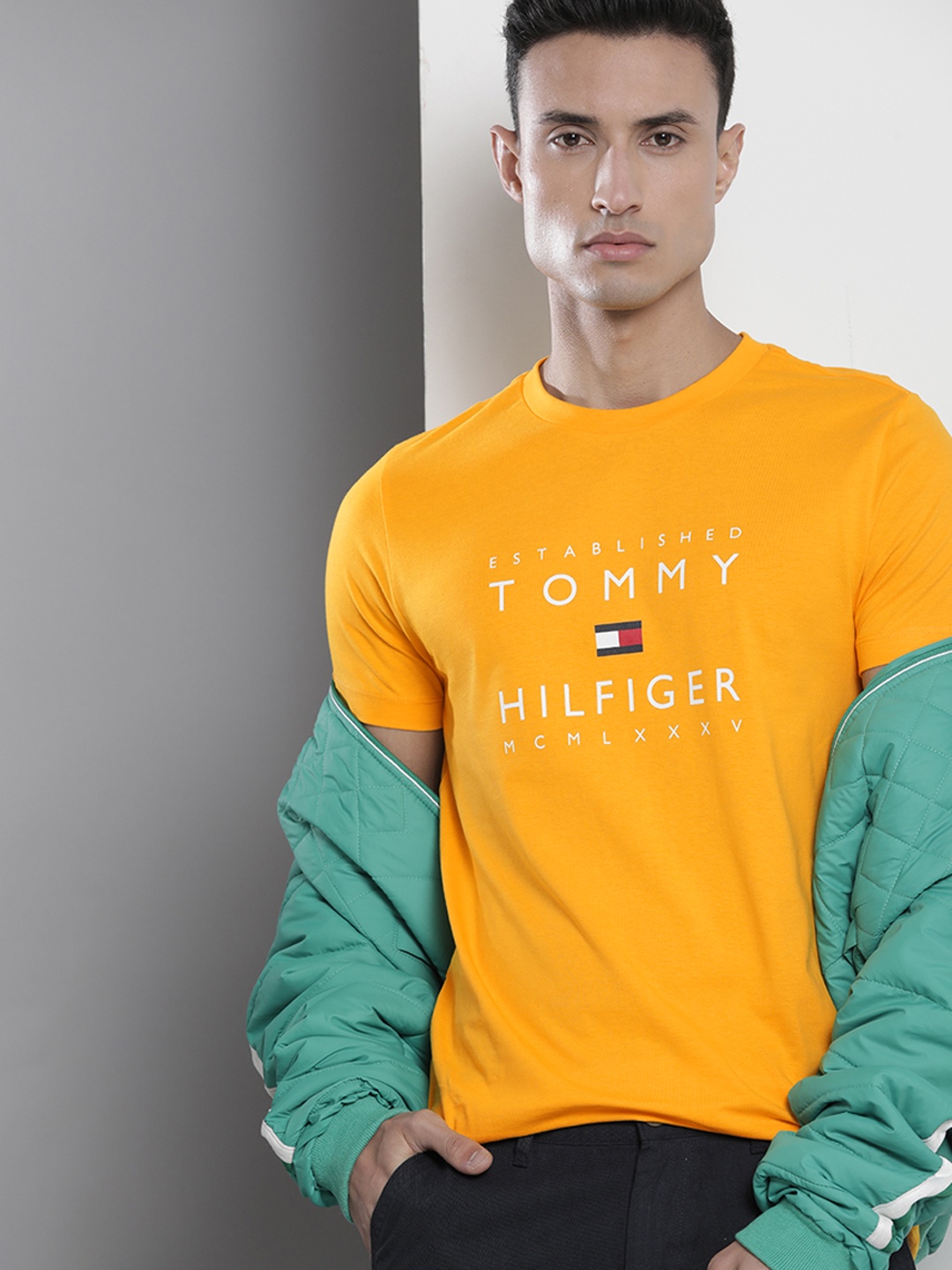 

Tommy Hilfiger Men Pure Cotton Brand Logo Printed Slim Fit T-shirt, Mustard