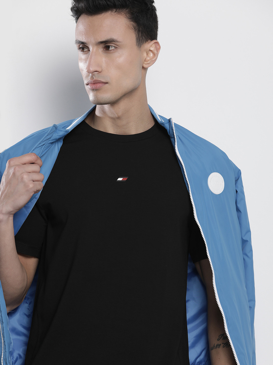 

Tommy Hilfiger Men Solid T-shirt, Black