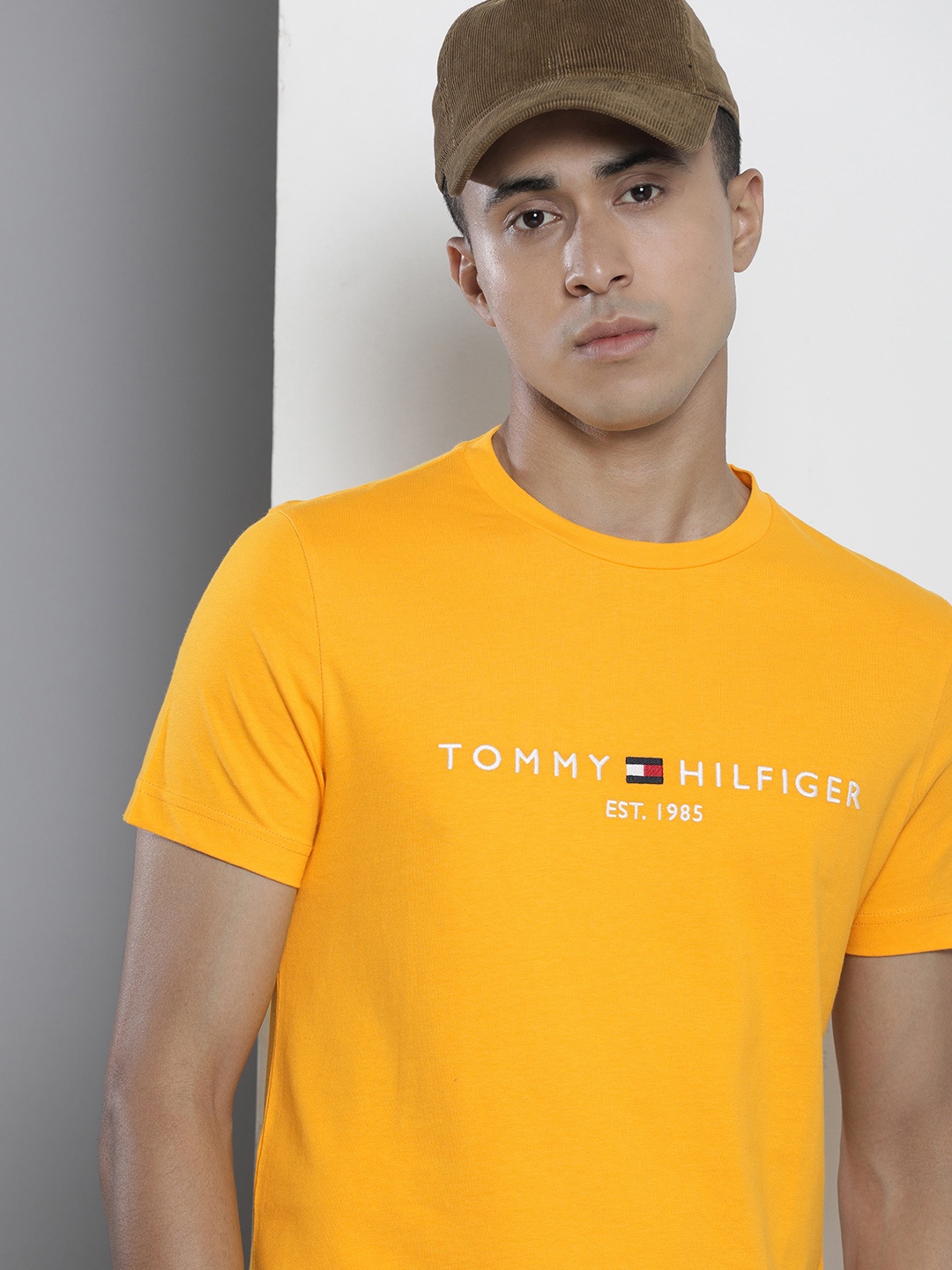 

Tommy Hilfiger Men Brand Logo Embroidered Pure Cotton Slim Fit T-shirt, Yellow