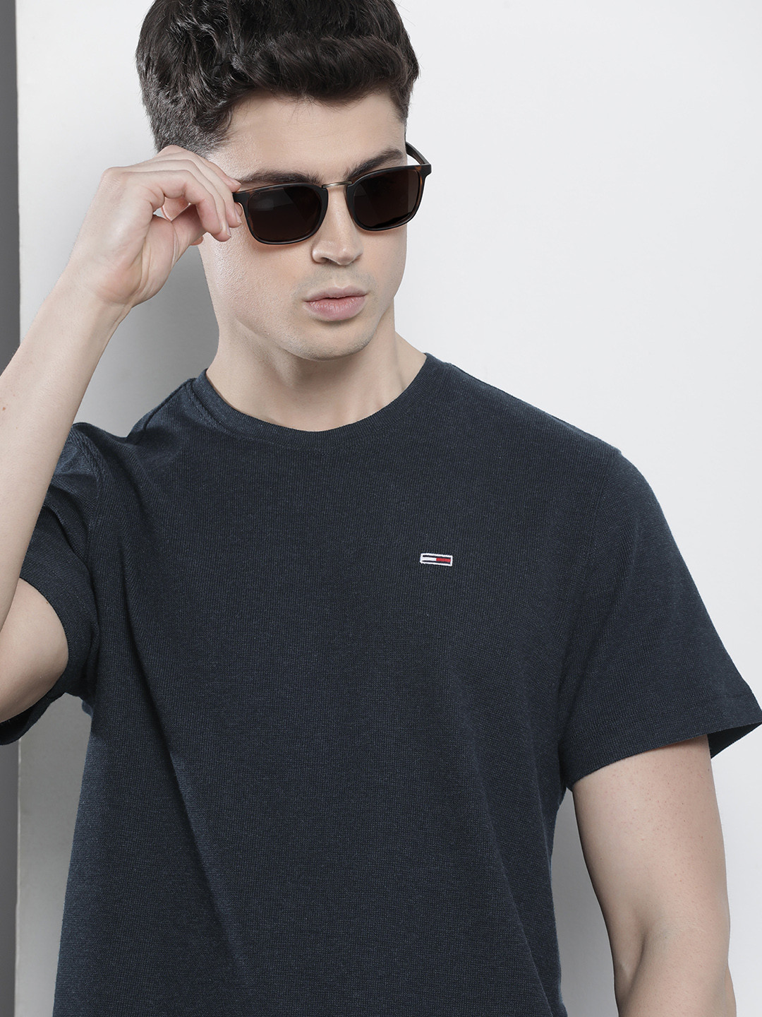 

Tommy Hilfiger Men Solid Round Neck T-shirt, Black