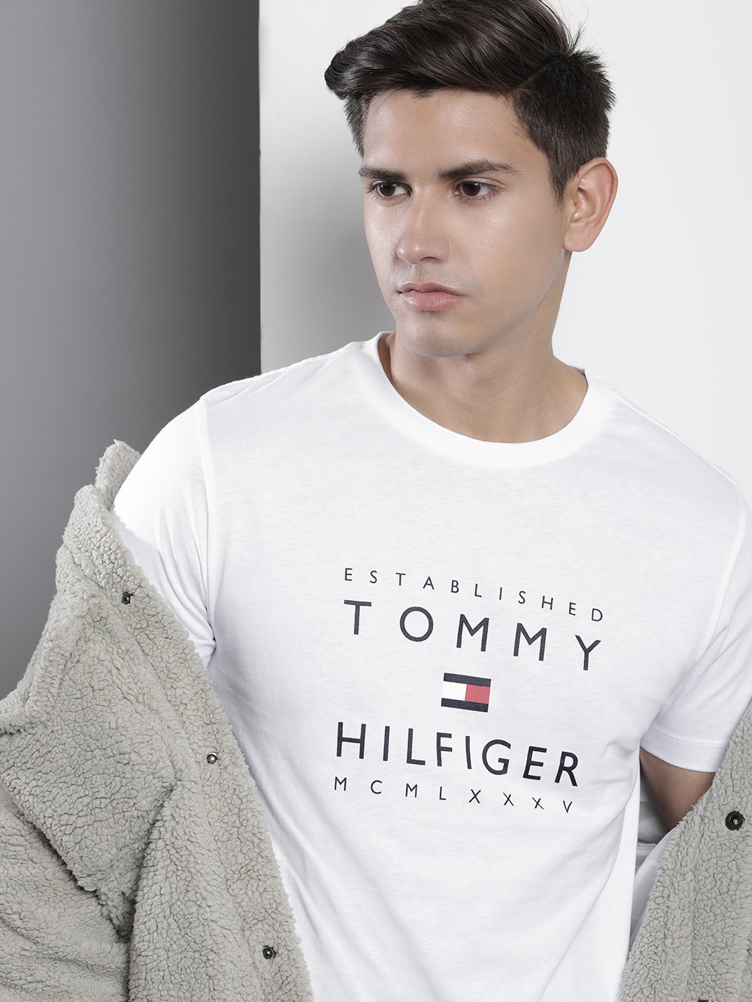 

Tommy Hilfiger Men Pure Cotton Sustainable Brand Logo Printed Slim Fit T-shirt, White