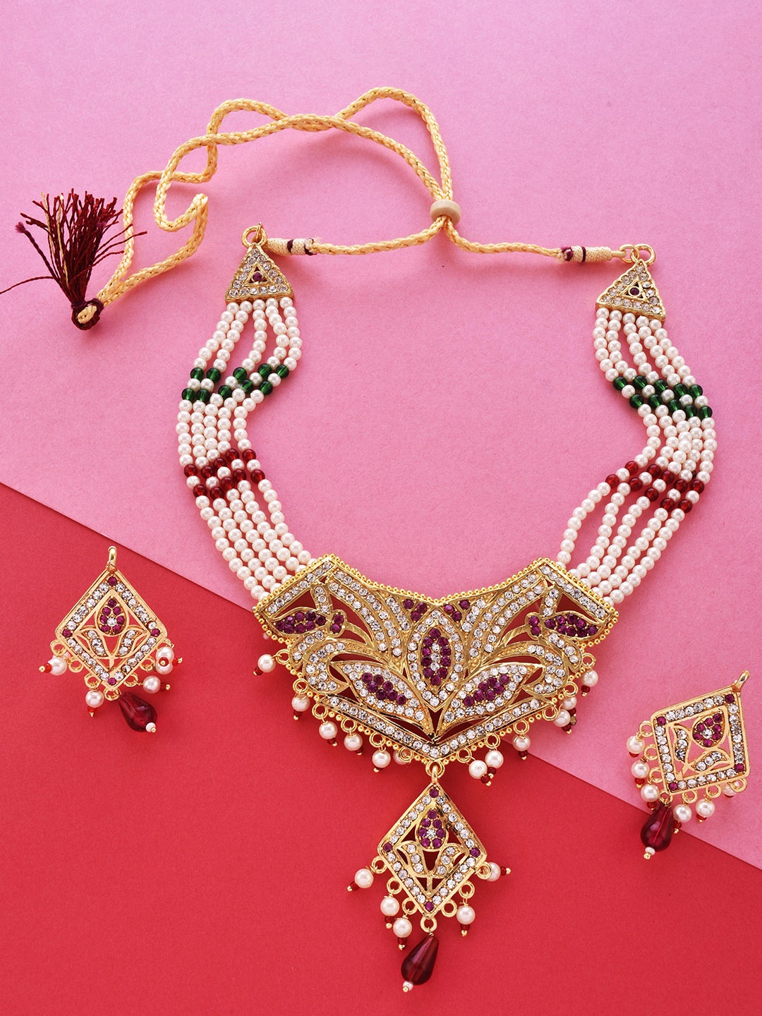 

The Pari Gold-Plated Stone Studded & Pearls Beaded Jewellery Set