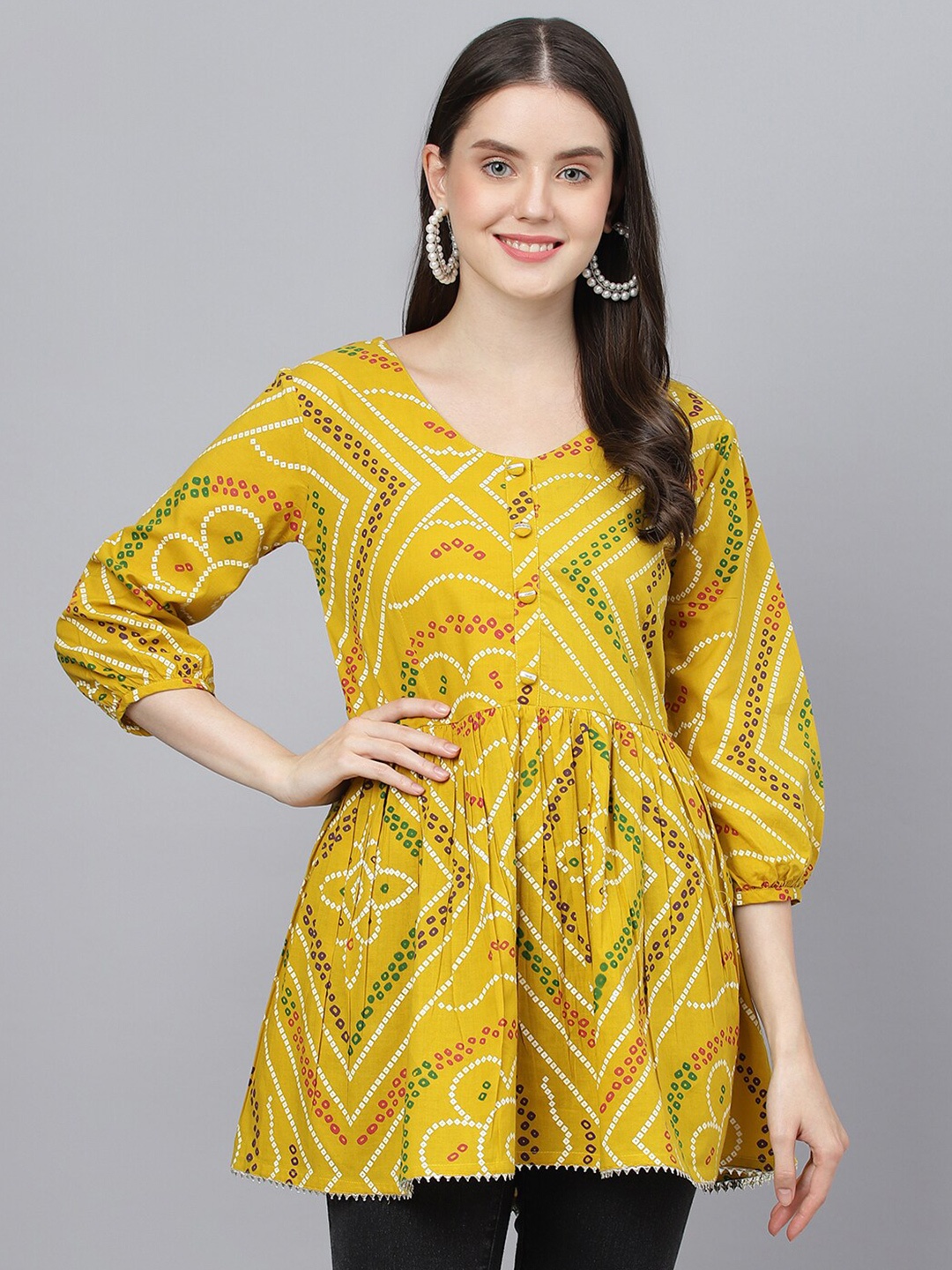 

Divena Mustard Ethnic Motifs Printed Longline Top