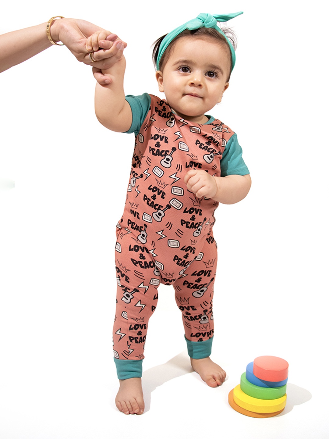 

Whistle & Hops Kids Love & Peace Printed Romper, Rust