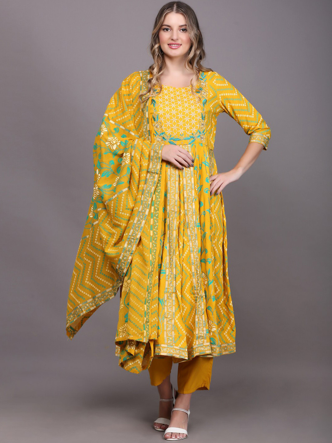 

TOULIN Women Floral Printed Thread Work Kurta With Trousers & Dupatta, Mustard