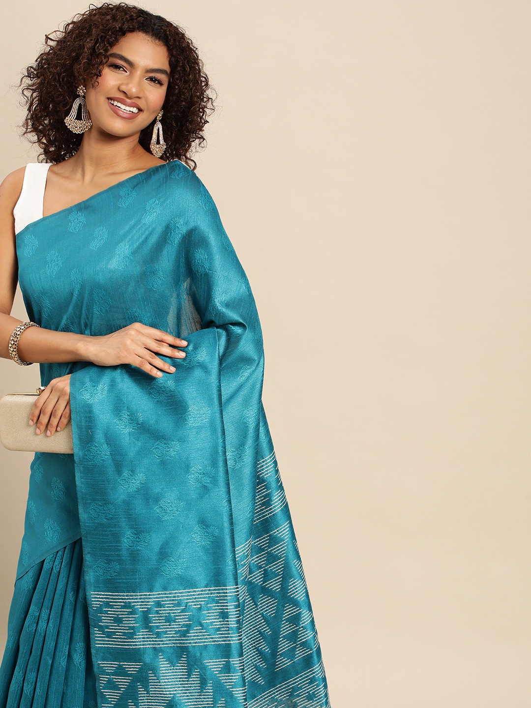 

Pothys Turquoise Blue Ethnic Motifs Jute Silk Saree