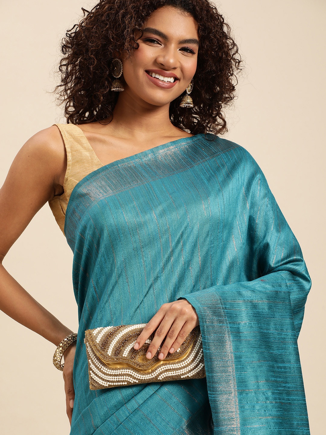 

Pothys Turquoise Blue Striped Jute Silk Saree