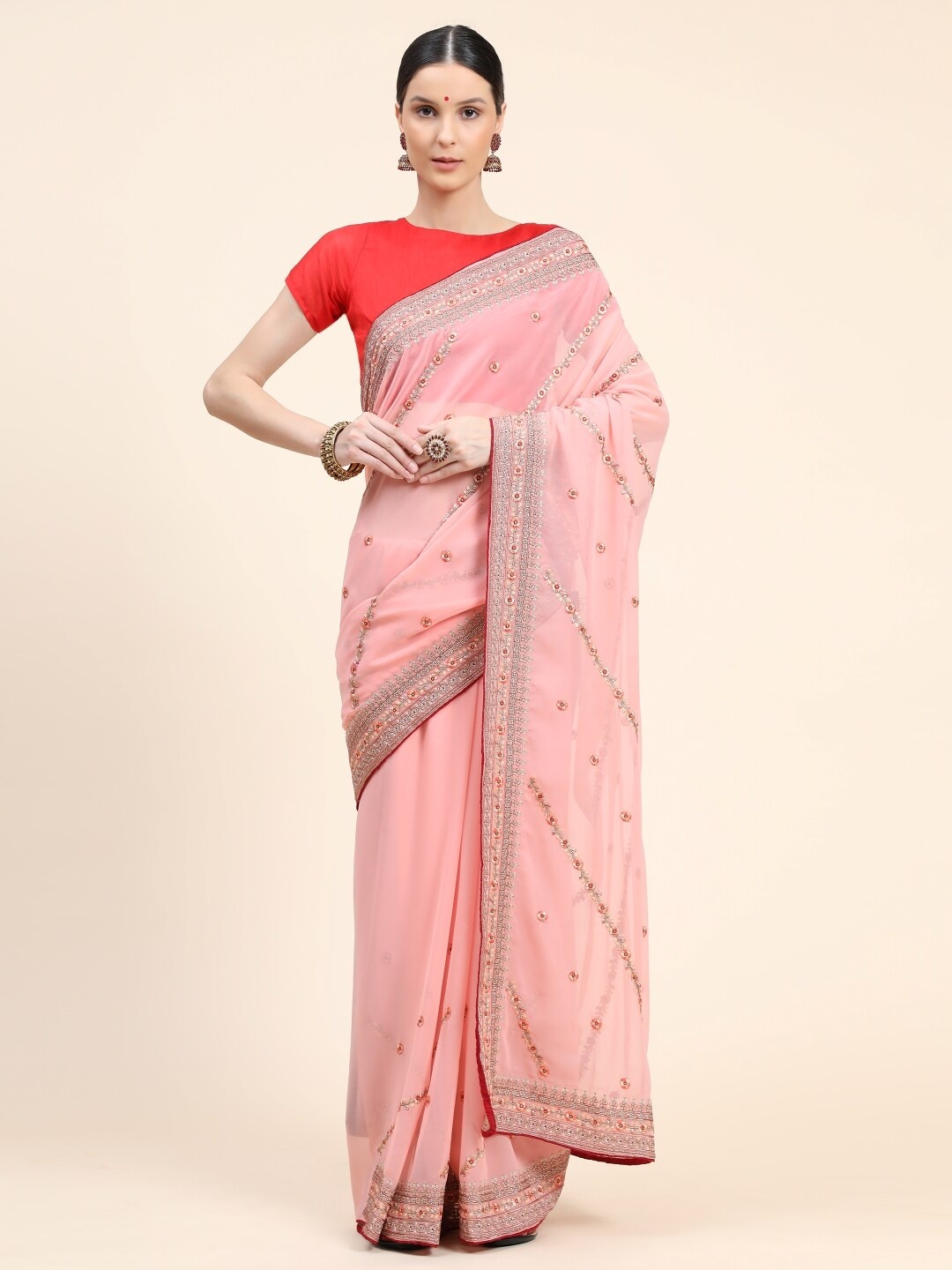 

Ambuja International Floral Pure Georgette Saree, Peach