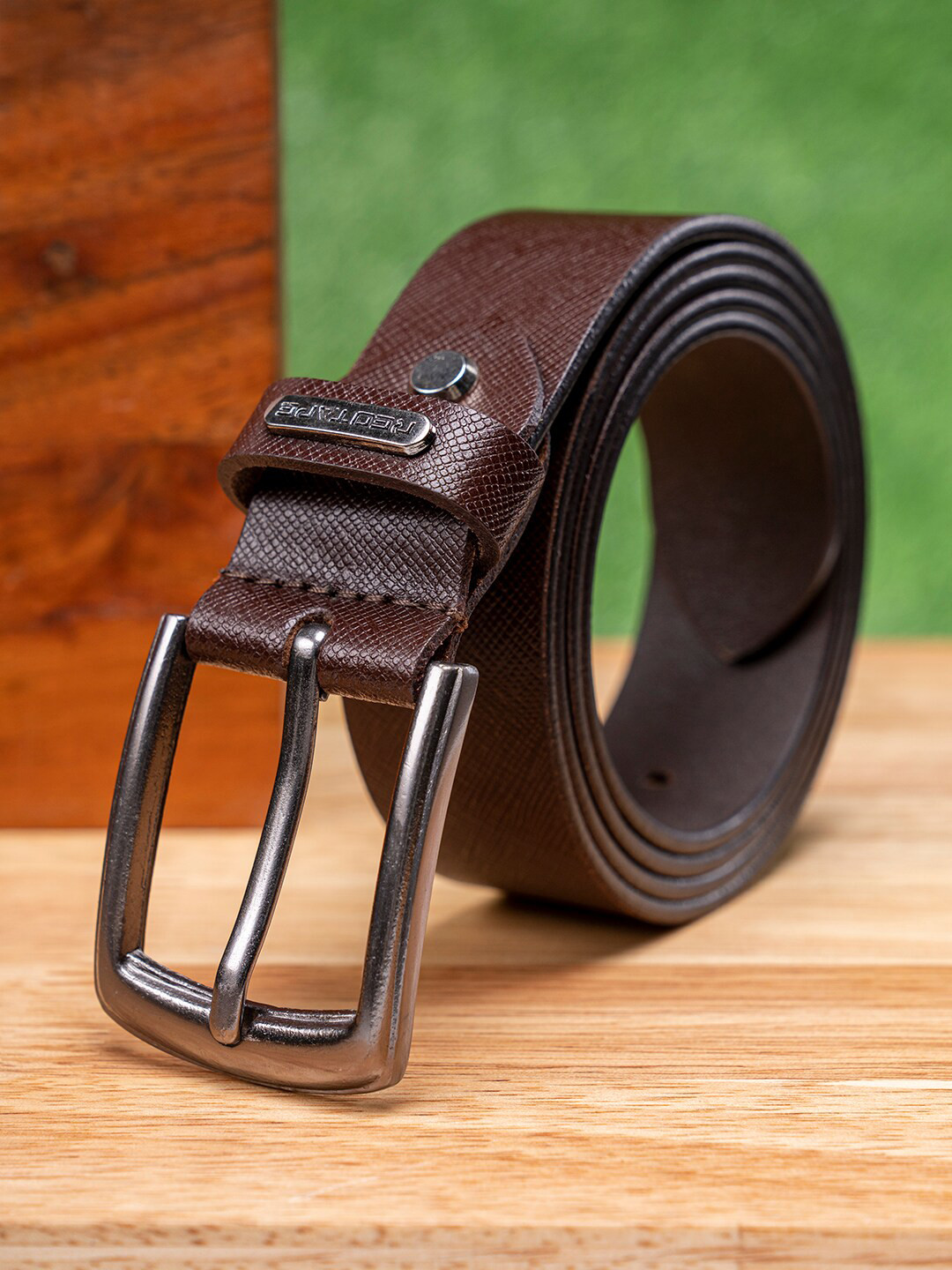 

Red Tape Men Brown Textured Leather Formal Belt
