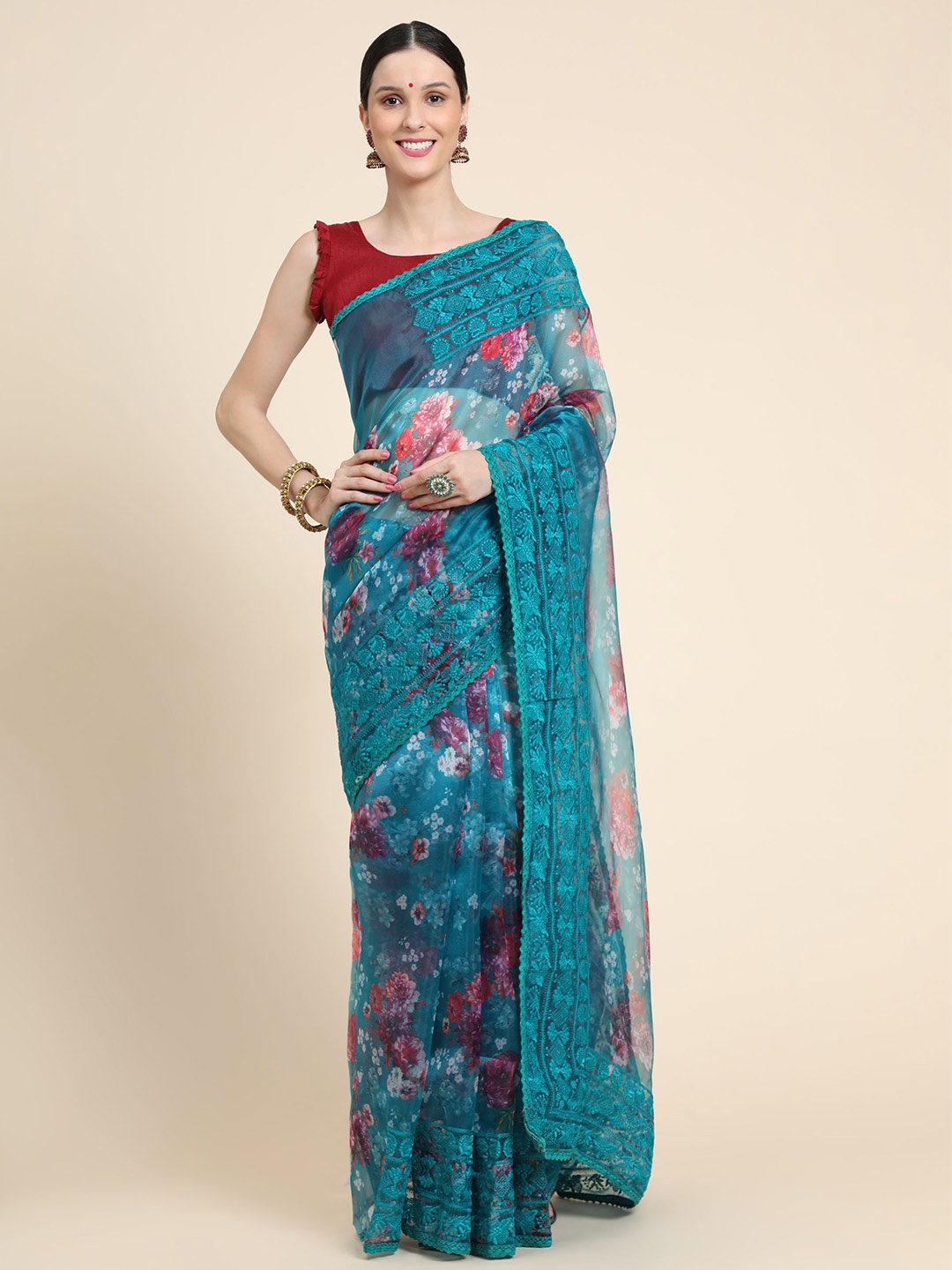 

Vastrasky Global Teal & White Floral Embroidered Mysore Silk Saree