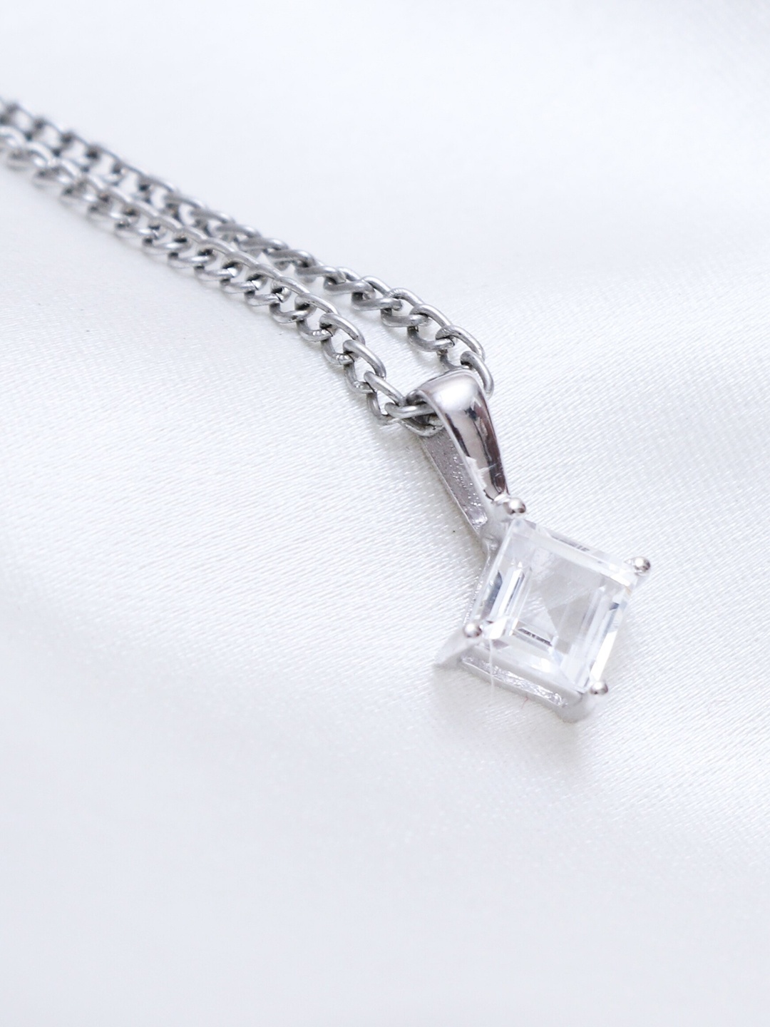 

HIFLYER JEWELS Stainless Steel Topaz Stone Studded Pendant With Chain, White