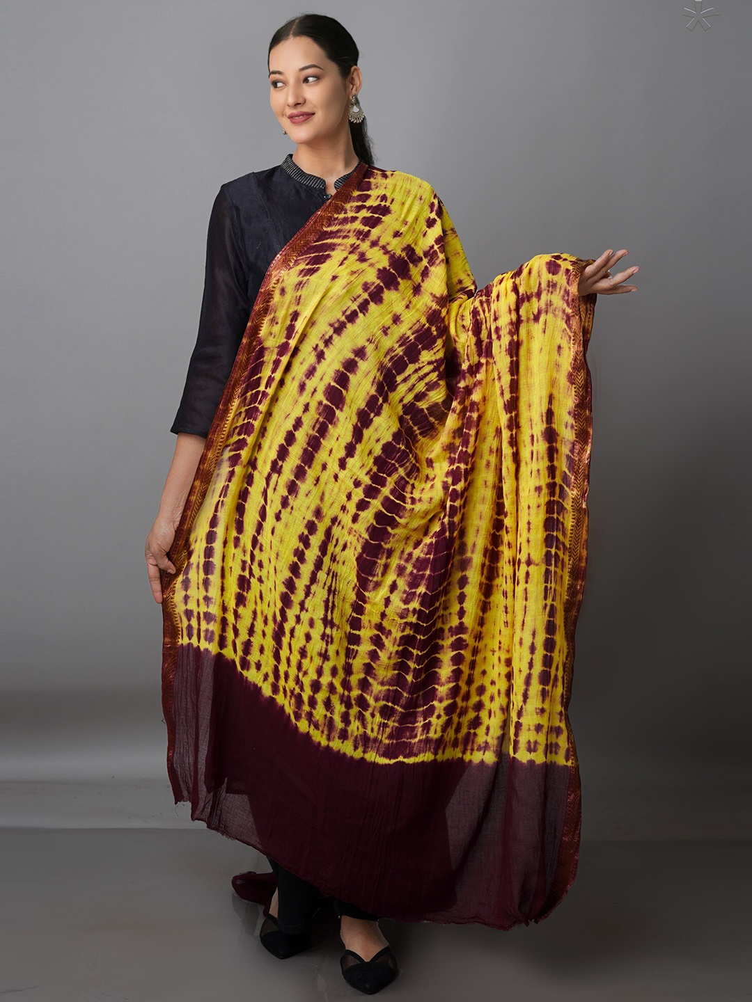 

Unnati Silks Purple & Yellow Dyed Pure Cotton Shibori Dupatta