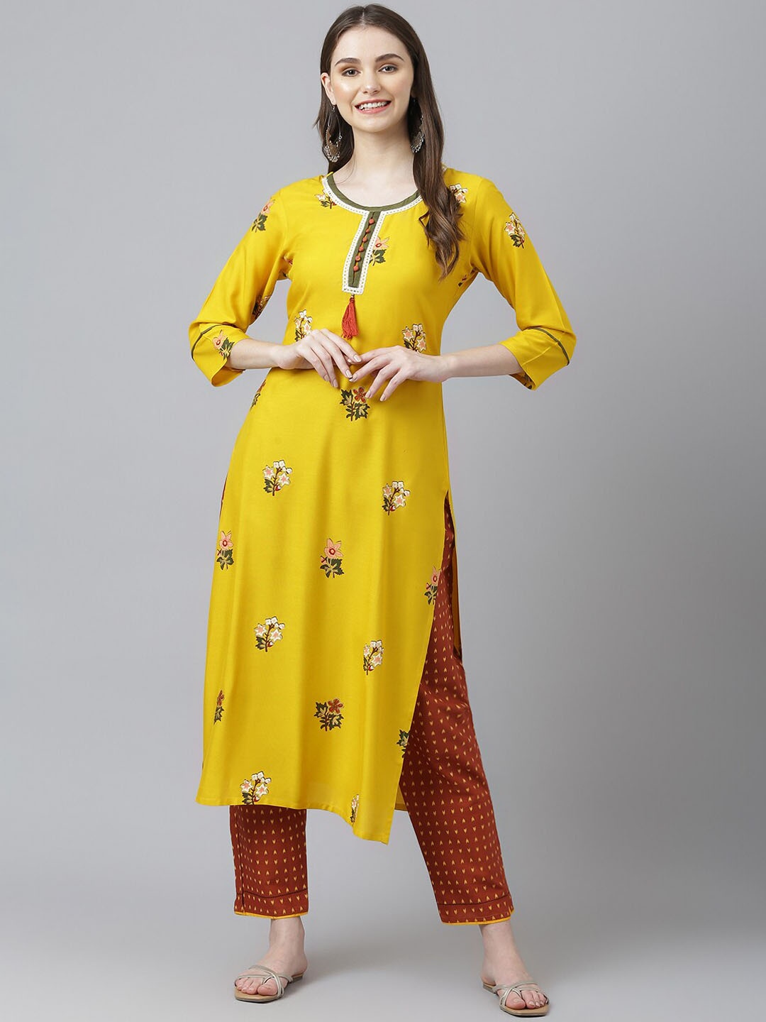 

Kiana Floral Printed Thread Work Kurta with Trousers, Yellow