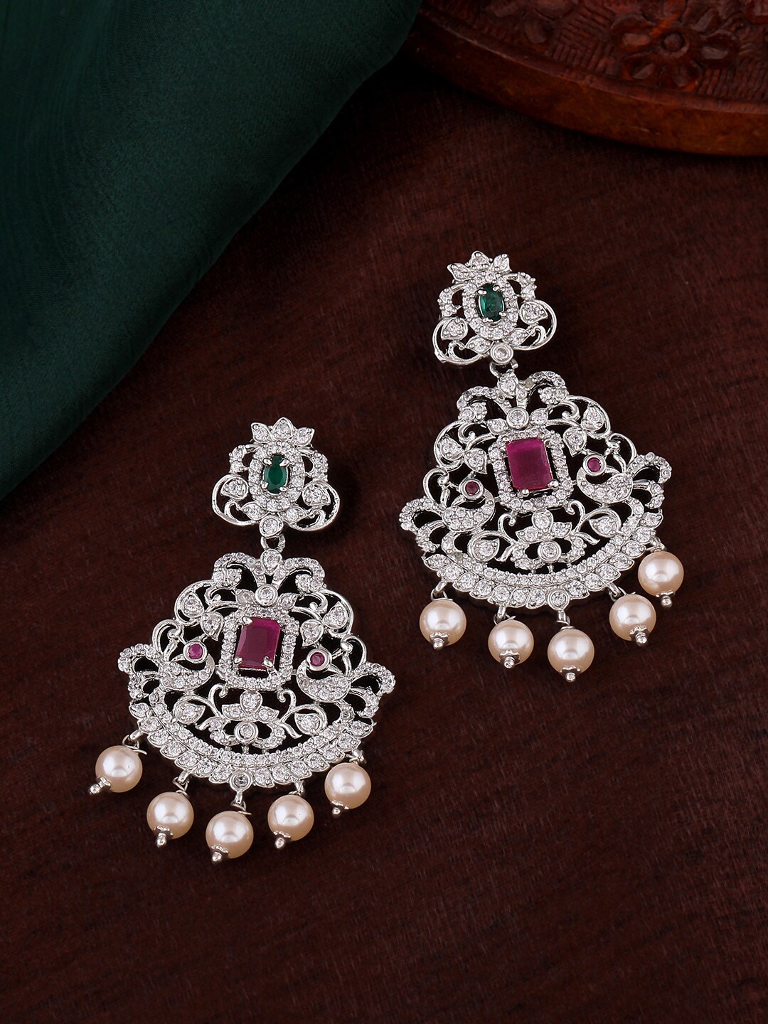 

Estele Silver-Plated Peacock Shaped Chandbalis Earrings
